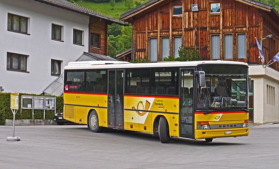 Yellow Bus in parking space