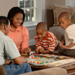 family playing board games